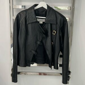 Black leather jacket with gold clips very stylish for fall
